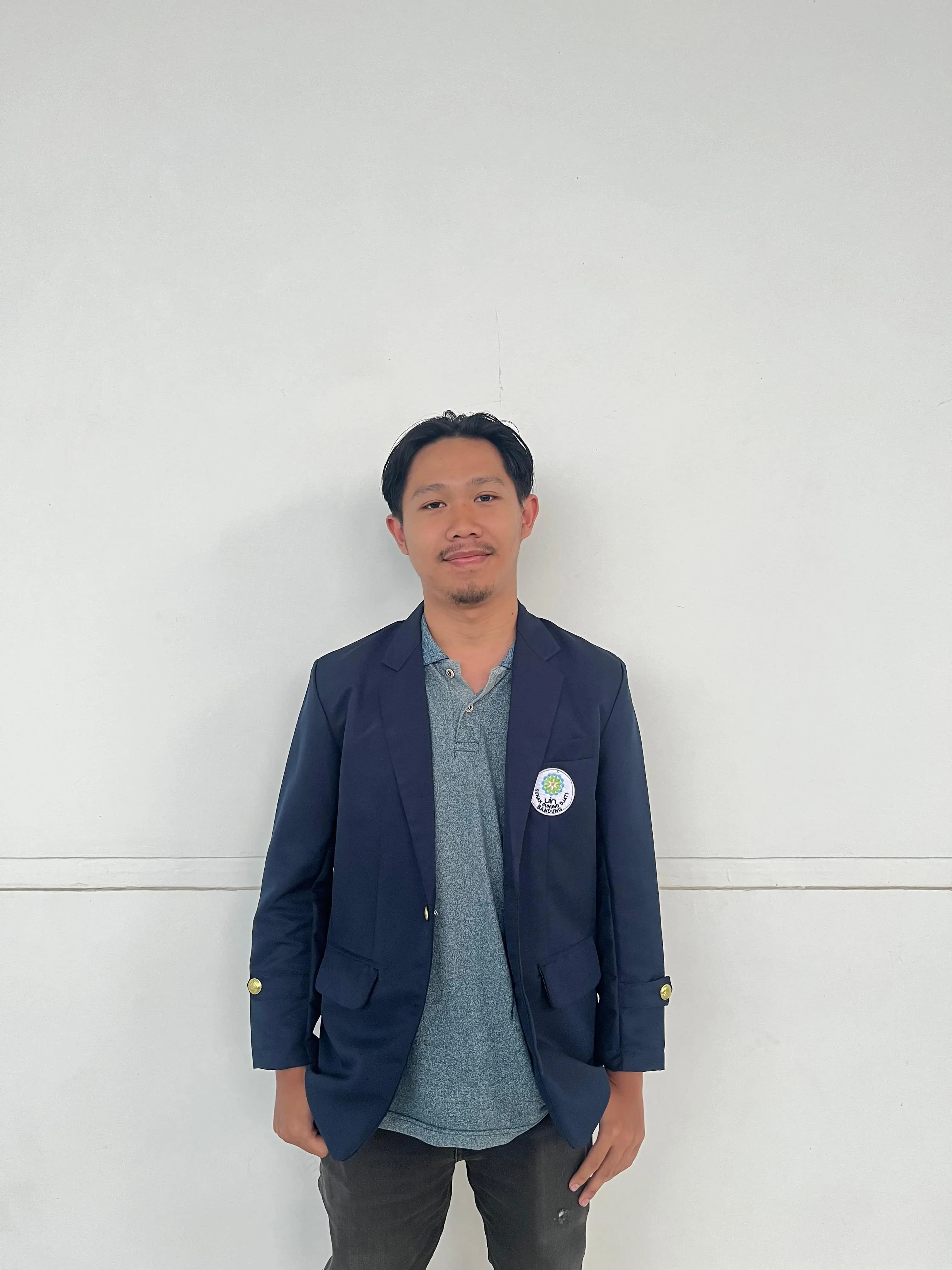 A portrait of Dimas Arya Nurhakim